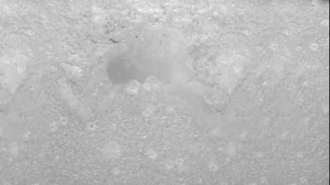 Slow Motion Shot of Ice Breaking Texture Stock Footage 310873251