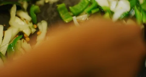 Slow Motion shot of a India Mix Vegetable Dish being prepared Stock Footage 116655474