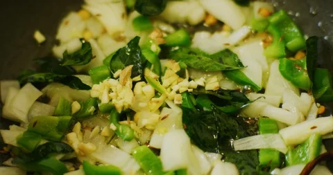 Slow Motion shot of a India Mix Vegetable Dish being prepared Stock Footage 116659616