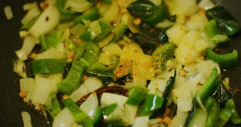 Slow Motion shot of a India Mix Vegetable Dish being prepared Stock Footage 116665059