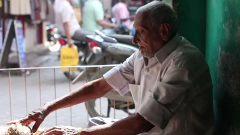 Slow motion shot of Indian old man, Kindness, working concept. Stock Footage 240736539