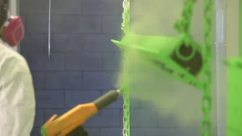 Slow Motion Shot of Industrial Electrostatic Powder Coating Stock Footage 75291951