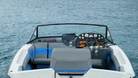 Slow motion shot: An interesting perspective on a small pleasure boat. Adriatic 動画素材 128202775