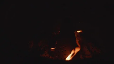 Slow motion shot of joss paper money being burnt Stock Footage 88850736
