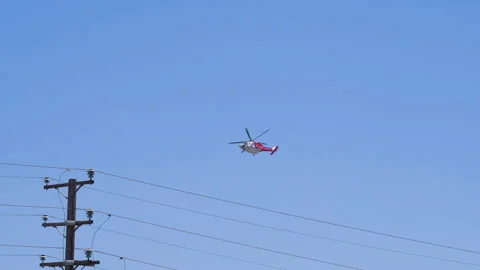 Slow motion shot of LAFD responding to wildfire with aerial unit Stock Footage 335974691