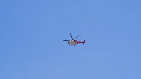 Slow motion shot of LAFD responding to wildfire with aerial unit Stock Footage 335975698
