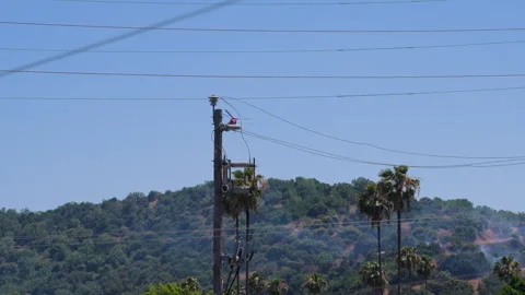 Slow motion shot of LAFD responding to wildfire with aerial unit Stock Footage 335976595