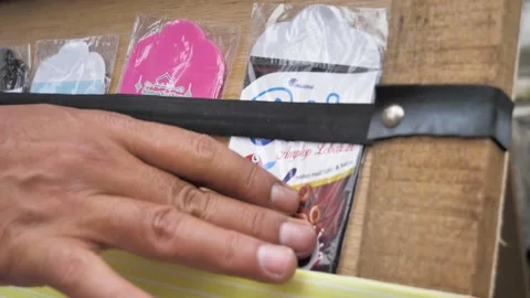 Slow Motion shot of Lebaran or Hari Raya envelopes is being prepared. Duit Stock Footage 239592320