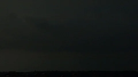 Slow motion shot of a lightning strike in the forest at night Stock Footage 78560197