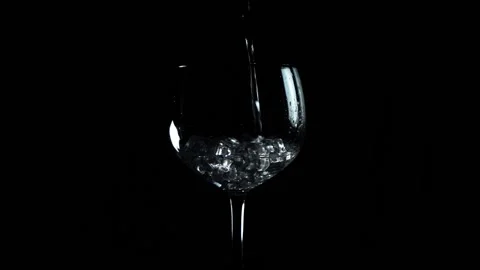 Slow Motion Shot Of Liquid Being Poured Into Glass Stock Footage 155981877
