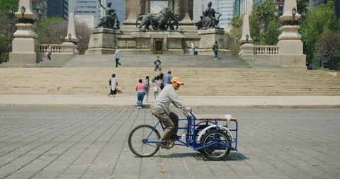 Slow motion shot of local people and their morning commute near Angle De La Stock Footage 99125232