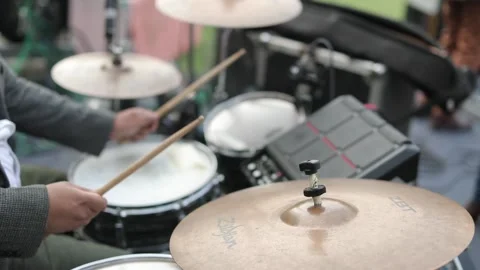 A Slow Motion Shot of a man playing Drums at an Indian Wedding function Stock Footage 219209673