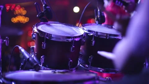 A Slow Motion Shot of a man playing Drums at an Indian Wedding function Stock Footage 219209674
