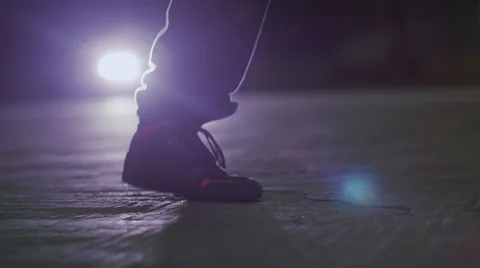 Slow motion shot of man skipping at night with a jump rope Stock Footage 47531149