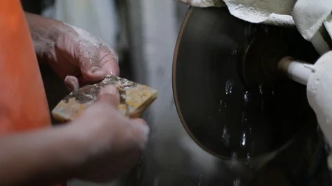 Slow motion shot of man working with semiprecious stone. Slicing onix, jewelry 스톡 동영상 119000847