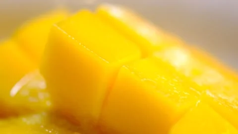 Slow Motion Shot of Mango Cube Slices. Stock Footage 306960672