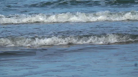 Slow Motion Shot Of Ocean Waves Crashing On Sandy Beach Stock Footage 253389873