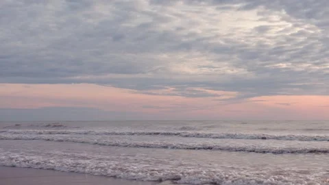 Slow motion shot of ocean waves onto the beach in Phuket, Thailand Stock Footage 327527431