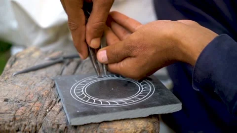 Slow motion shot of Pakistani marble art on rocks Stock-Footage 199268596