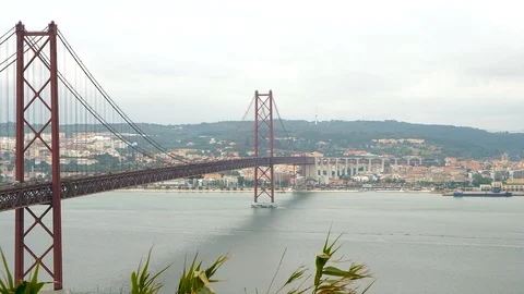Slow motion shot panoramic view 25th of April Bridge in Lisbon Stock-Footage 99725544