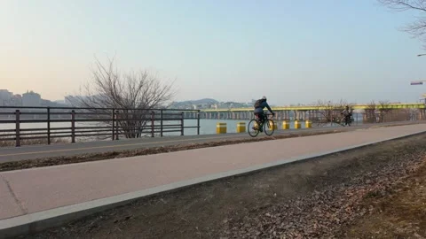 Slow motion shot of people doing activity at Hangang Park in Seoul, South Kor Stock Footage 303232695