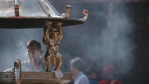 Slow motion shot of people make merit in Chinese Lunar New Year's Eve Stock Footage 88850108