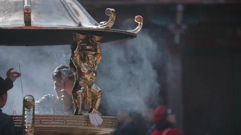 Slow motion shot of people make merit in Chinese Lunar New Year's Eve Stock Footage 88850138