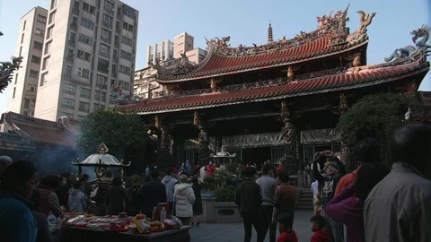 Slow motion shot of people make merit in Chinese Lunar New Year's Eve Stock Footage 88850434