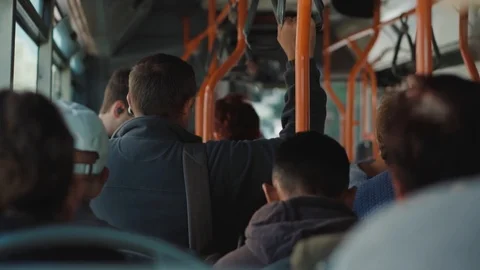 Slow motion shot of people riding the bus. Commuters on public transport Stock Footage