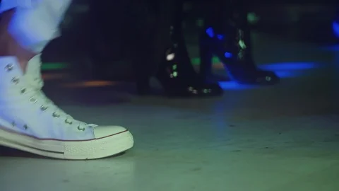 Slow motion shot, person is dancing on a dance floor, dancing moves.  Stock Footage 120842677