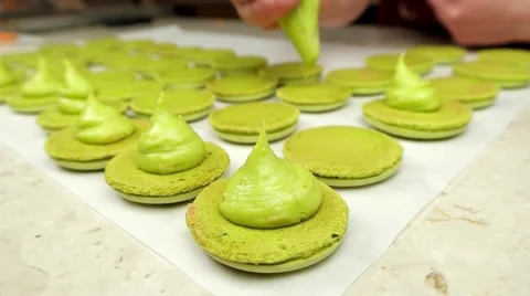 Slow motion shot of preparing pistachio Macaroons Stock Footage 62426342