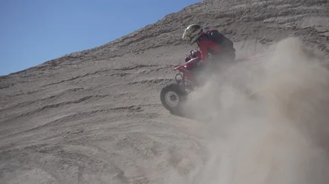 Slow motion shot of quad with big sand ejection close view Stock Footage 64669864