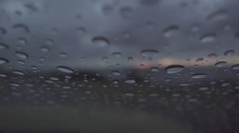 Slow motion shot of rain wiped on the windshield Stock Footage 64670236