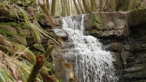 Slow motion shot of a river flow / waterfall Stock Footage 73226191