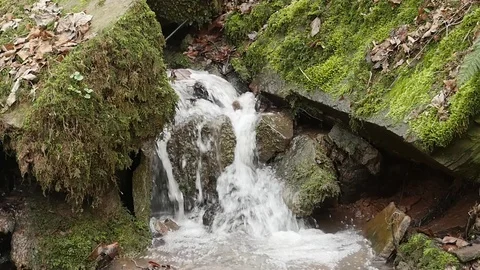 Slow motion shot of a river flow / waterfall Stock Footage 73226409