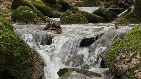 Slow motion shot of a river flow / waterfall Stock Footage 73226446