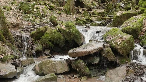 Slow motion shot of a river flow / waterfall Stock Footage 73226549