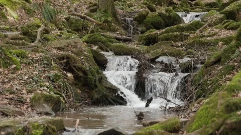 Slow motion shot of a river flow / waterfall Stock Footage 73226703