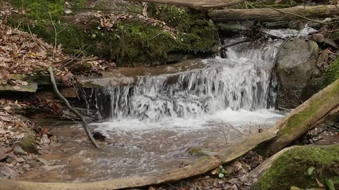 Slow motion shot of a river flow / waterfall Stock Footage 73227276