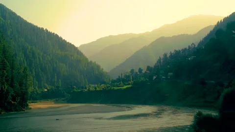 Slow motion shot of river with lush green mountains in hilly area of Pakista Stock Footage 200752902