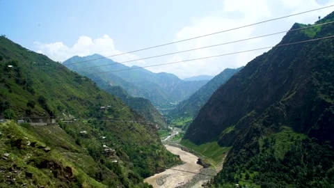 Slow motion shot of river with lush green mountains in hilly area of Pakista Stock Footage 200753223