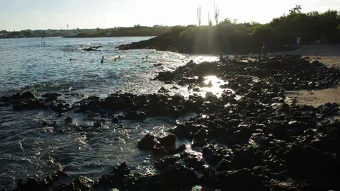 Slow motion shot from a rock beach in Galapagos during sunset Stock Footage 75846194