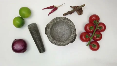 Slow motion shot of salt which falls into a mortar and Pestle Stock Footage 157942246