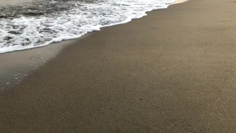 Slow motion shot of sea waves on a beach in Turkey Stock Footage 246118636