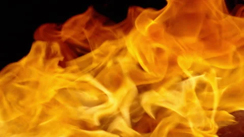 Slow motion shot showing the transition of flames and an explosion. Stock Footage 338094312