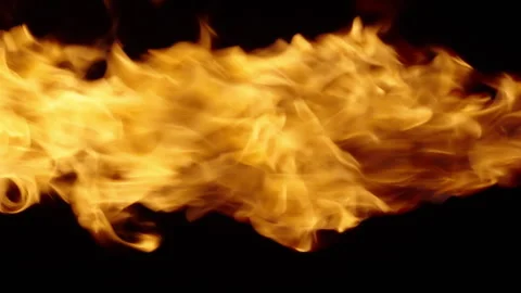 Slow motion shot showing the transition of flames and an explosion. Stock Footage 338270446