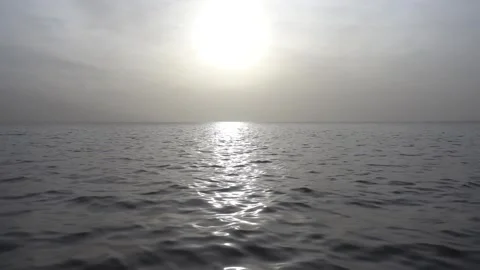 Slow motion shot of sun and sea 스톡 동영상 329470126