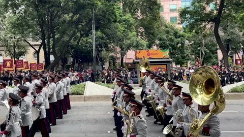 Slow motion shot of the symphony of the Mexican army during the military Vídeos de archivo 212064185