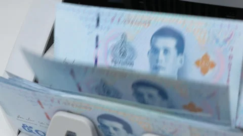 Slow Motion Shot of Thai Baht money counting in Machine. Paper THB Thai baht  Stock Footage 171640428