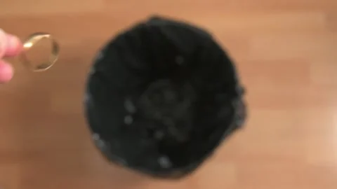 Slow Motion Shot of Throwing Wedding Ring In Bin Stock Footage 157173383